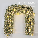Green PVC warm white torx tip fiber optic garland with gold house
